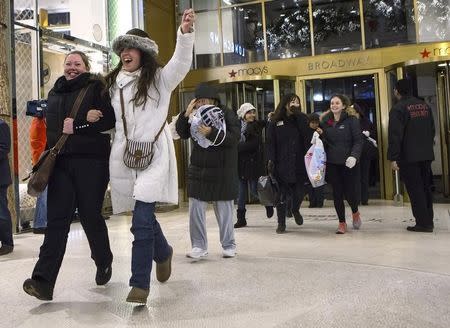 The first shoppers arrive at Macy's Herald Square on Thanksgiving Day in New York November 28, 2013. REUTERS/Eric Thayer