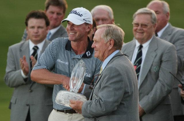 Jack Nicklaus stands with 2011Memorial Tournament champion Steve Stricker on the 18th green at Muirfield Village Golf Club, June 5, 2011. (Dispatch file photo)