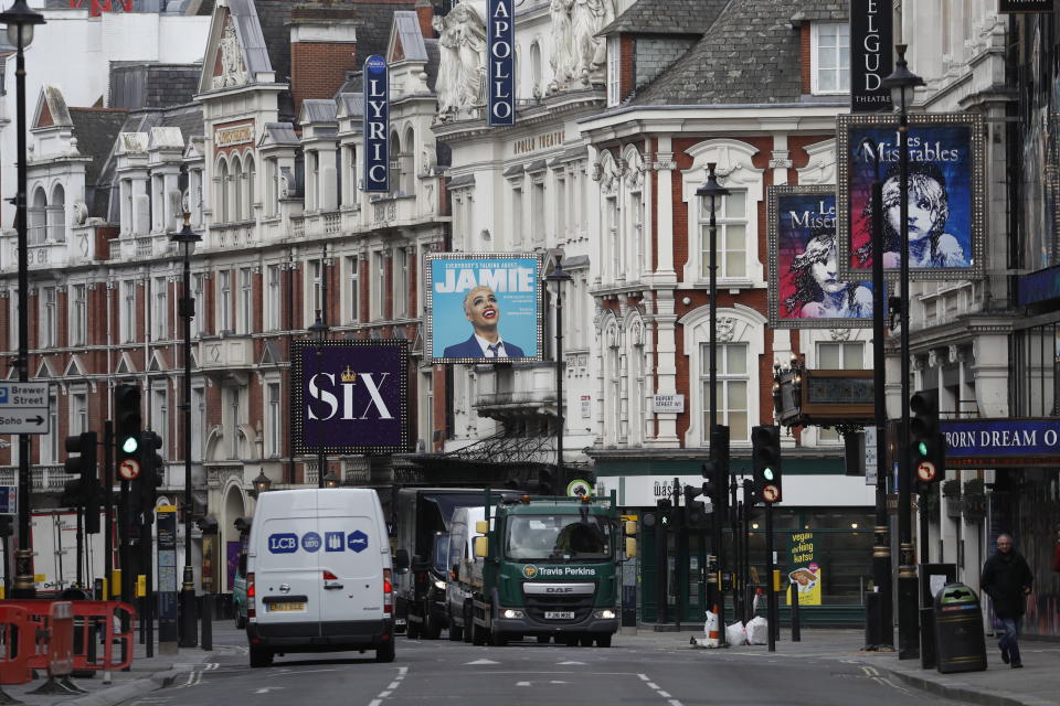 A general view of the exterior of the Apollo Theater, which is preparing to continue its run of the musical "Everybody's Talking About Jamie' in London, Thursday, April 8, 2021. The coronavirus pandemic has devastated British theater, a world-renowned cultural export and major economic force. The theaters in London's West End shut when lockdown began in March 2020, and have remained closed for most of the past 13 months. Now they are preparing, with hope and apprehension, to welcome audiences back. (AP Photo/Alastair Grant)