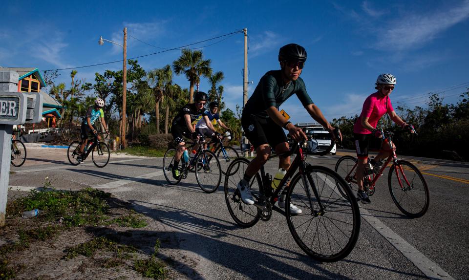 A group of cyclists takes off from the Sanibel Island chamber of Commerce Wednesday, Jan. 4, 2023. 