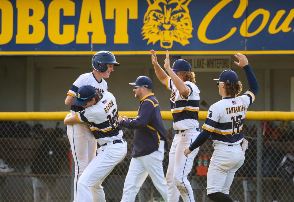 Whiteford celebrates after winning the first game of a doubleheader against Milan on Friday, May 5, 2023.