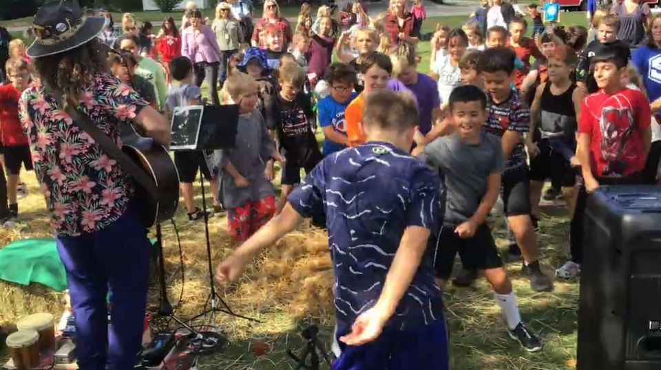 Third and fourth graders from Seabrook Elementary dance at the fall festival.