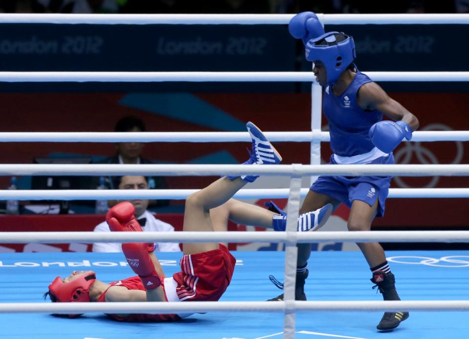 Adams knocked down Ren during the final (Nick Potts/PA) (PA Archive)