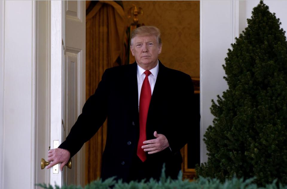 US President Donald Trump leaves the Oval Office to make a statement announcing that a deal has been reached to reopen the government through Feb. 15 during an event in the Rose Garden of the White House January 25, 2019 in Washington, DC.  (Photo by Olivier Douliery-Pool/Getty Images)