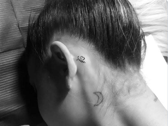 Ariana Grande head tattoo