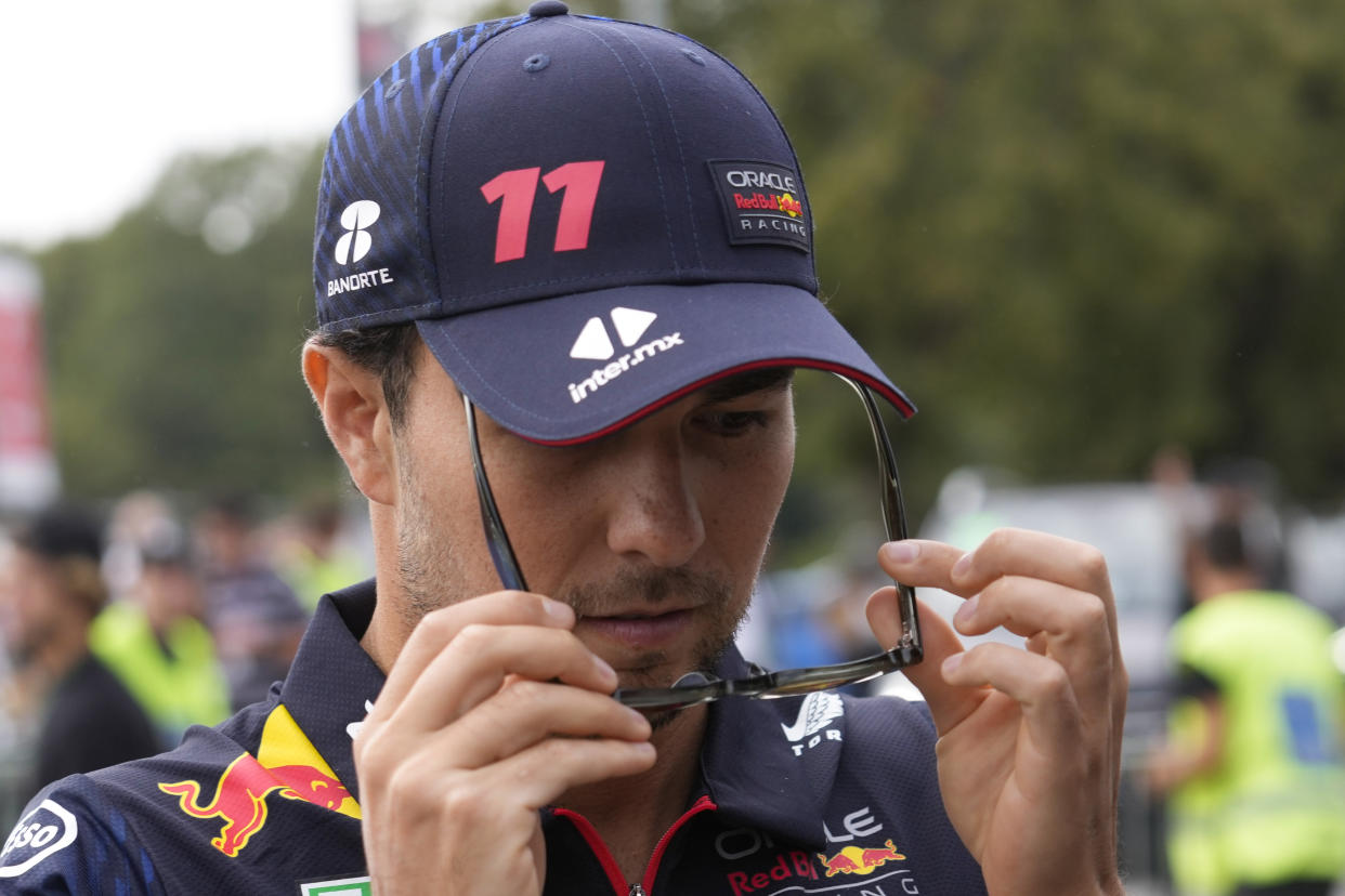 Red Bull driver Sergio Perez of Mexico arrives at the Monza racetrack, in Monza, Italy, Saturday, Sept. 2, 2023. The Formula one race will be held on Sunday. (AP Photo/Luca Bruno)