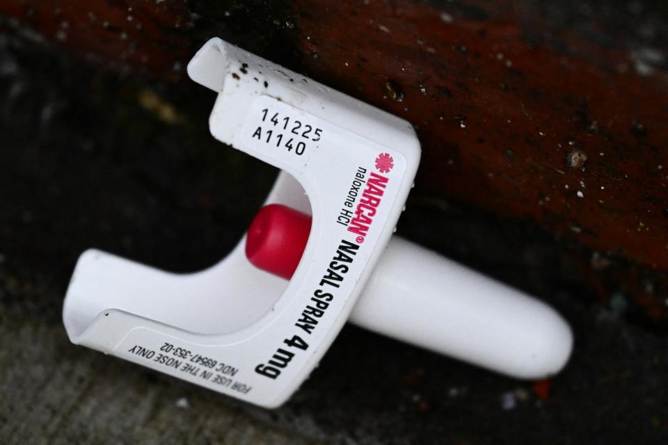 PHOTO: In this Jan. 25, 2024, file photo, a used Narcan brand Naloxone nasal spray rests on the street after paramedics and police responded to a suspected fentanyl drug overdose in Portland, Oregon. (Patrick T. Fallon/AFP via Getty Images, FILE)