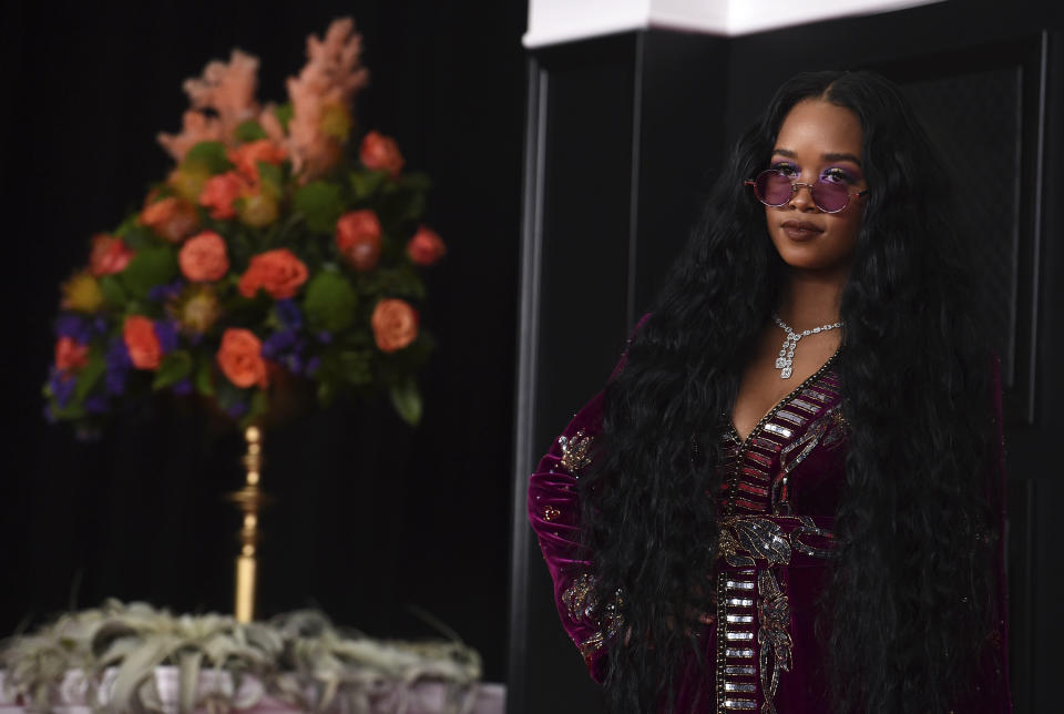 H.E.R. arrives at the 63rd annual Grammy Awards at the Los Angeles Convention Center on Sunday, March 14, 2021. (Photo by Jordan Strauss/Invision/AP)