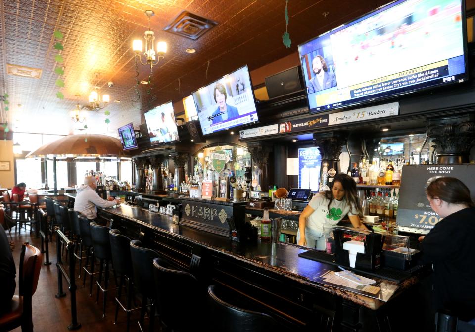 Multiple televisions sit above the bar at O’Rourke’s Public House on Tuesday, Sept. 19, 2023, at Eddy Street Commons south of the University of Notre Dame in South Bend.