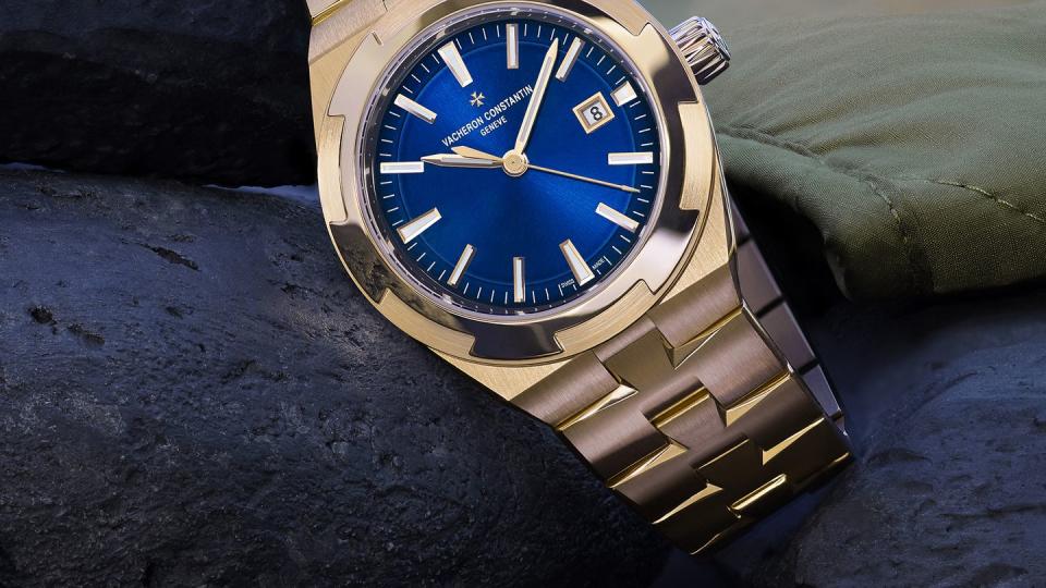 the overseas self winding in pink gold with a blue dial