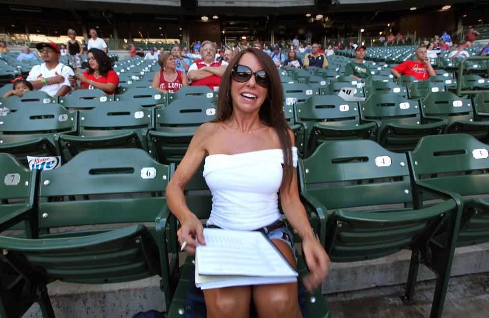 Amy Williams, a.k.a. Front Row Amy, is an avid Milwaukee Brewers fan and sits right behind home plate at most home games at American Family Field.