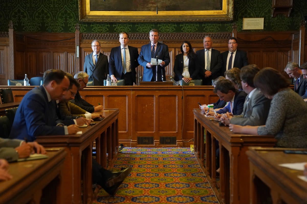 Sir Graham Brady, chairman of the 1922 Committee, announces the results of the second ballot round (PA)