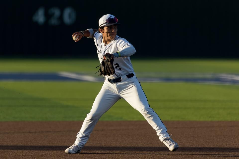 Del Valle's Sebastian Gloria (2) throws the ball at the Class 5A baseball playoffs, bi-district round against Chapin High School Thursday, May 4, 2023, at Del Valle High School, in El Paso, Texas.