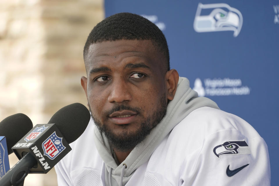 Seattle Seahawks free safety Quandre Diggs talks to reporters after NFL football practice Tuesday, June 7, 2022, in Renton, Wash. (AP Photo/Ted S. Warren)