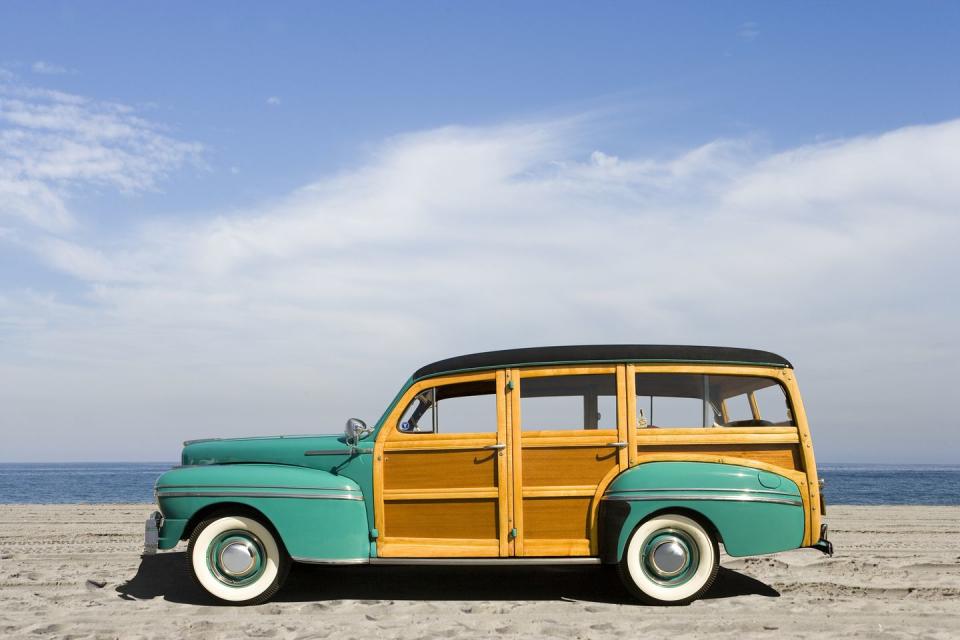 Riding in the family's wood-paneled station wagon.