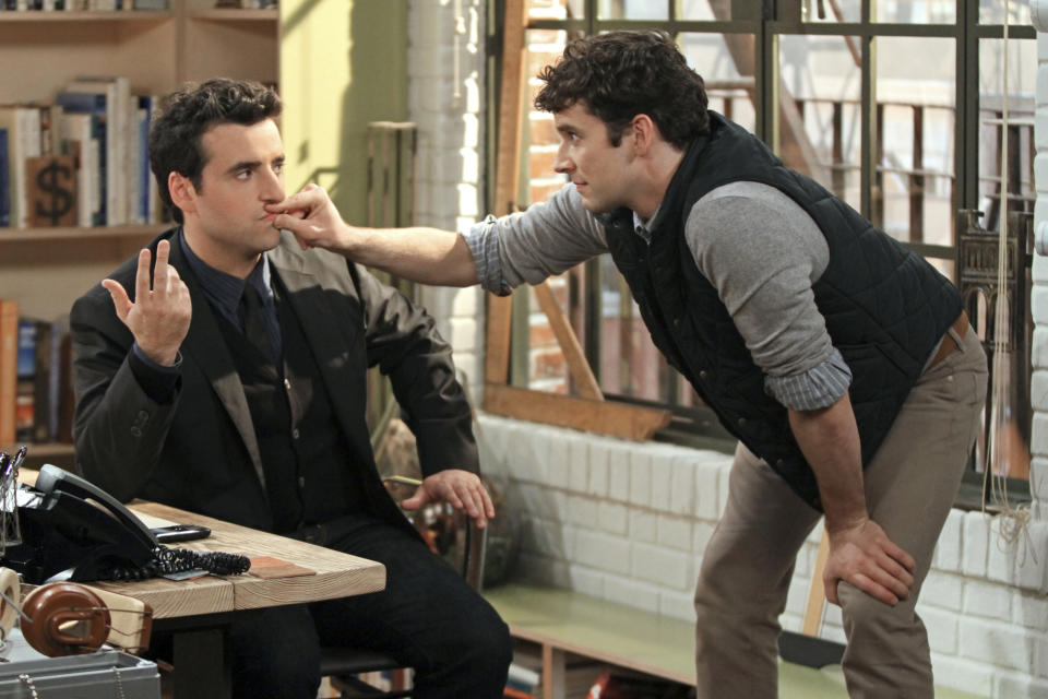 This undated image released by CBS shows David Krumholtz, left, as Joe, a newly-engaged, accomplished architect and Michael Urie , who stars as Louis, Joe's gay co- worker and best friend in a scene from "Partners," a comedy premiering Monday, Sept. 24, at 8:30 p.m. EST on CBS. (AP Photo/CBS, Matt Kennedy)