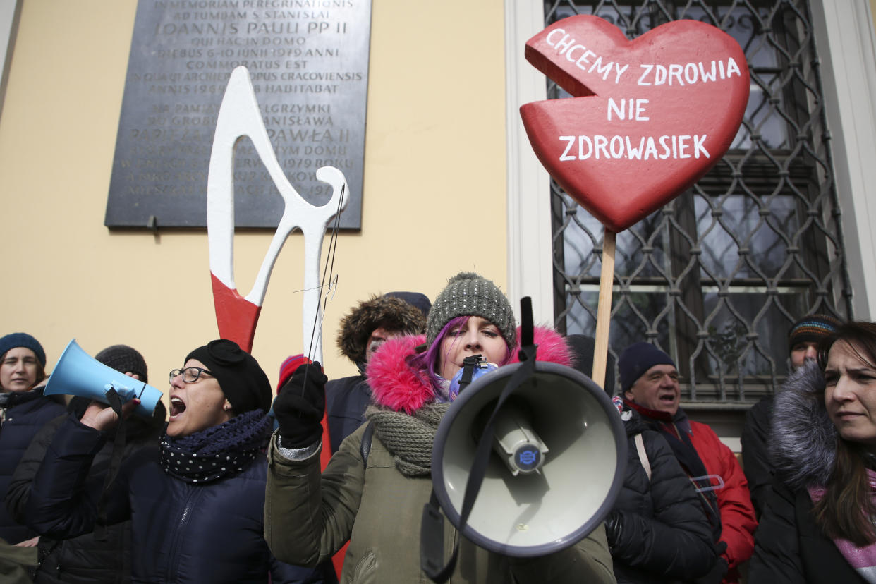 Women protest a stricter anti-abortion measure in front of archdiocese headquarters in Krakow, Poland, on March 18, 2018. (Photo: Beata Zawrzel/NurPhoto via Getty Images)