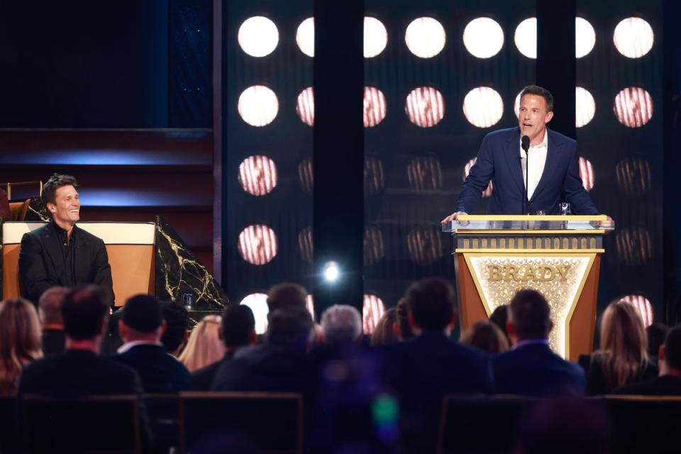 Tom Brady and Ben Affleck speak onstage at the Tom Brady Netflix roast on 5 May 2024 in Inglewood, California. (Getty)