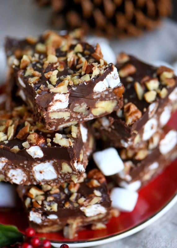 <p>Heavenly Hash Truffle Bars are loaded with coconut, pecans, marshmallows and chocolate and topped with a decadent ganache. </p><p>Get th recipe: <a href="https://www.momontimeout.com/heavenly-hash-truffle-bars-recipe/" rel="nofollow noopener" target="_blank" data-ylk="slk:Fudge Stuffed Chocolate Chip Cookie Bars;elm:context_link;itc:0;sec:content-canvas" class="link rapid-noclick-resp"><strong>Fudge Stuffed Chocolate Chip Cookie Bars</strong></a></p>