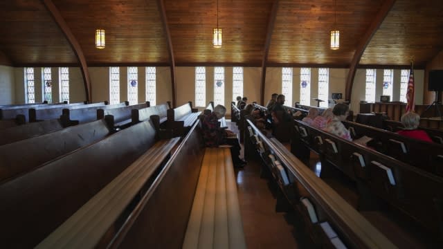 Roughly a dozen people attend pastor Ryan Burge's Sunday service.