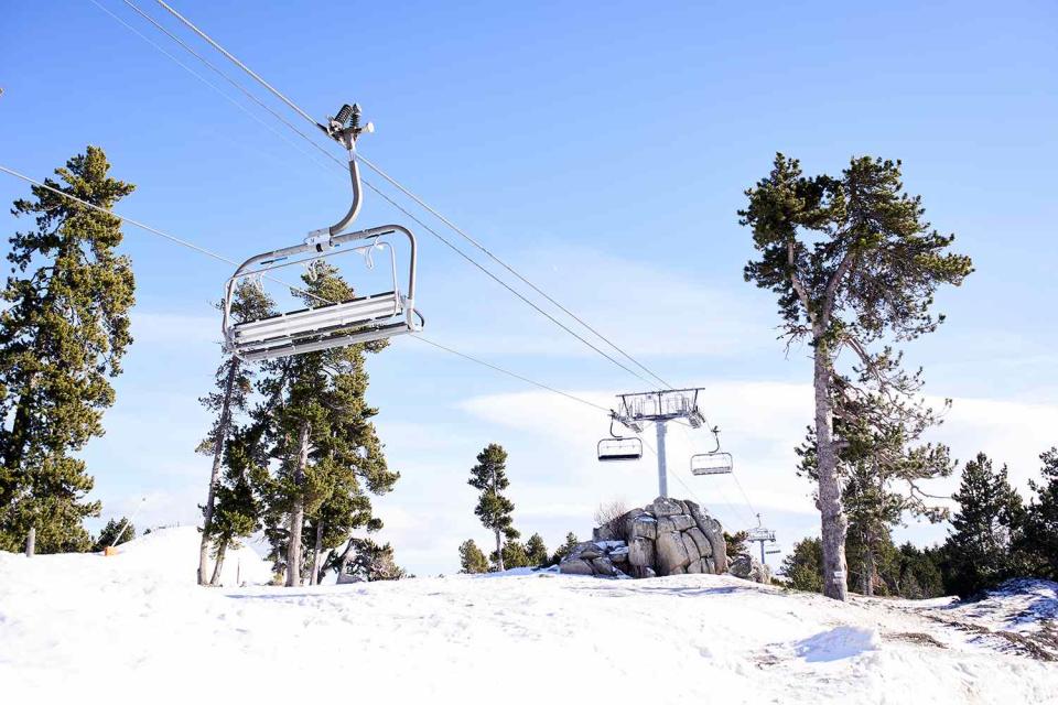 <p>Getty Images</p> A photo of a chairlift above the snow.