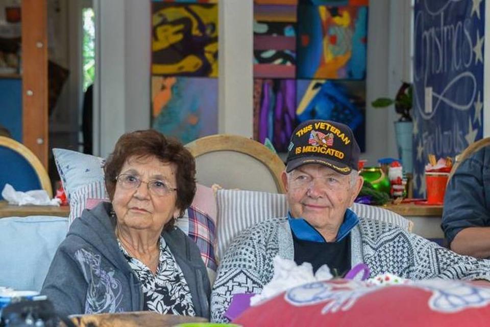 Genevieve Lane, left, and her husband, Jim Goetcheus, on Dec. 25, 2018, in Raleigh. Goetcheus died Sept. 26, 2020, at the age of 85, and his family is waiting to have a funeral at Arlington National Cemetery.