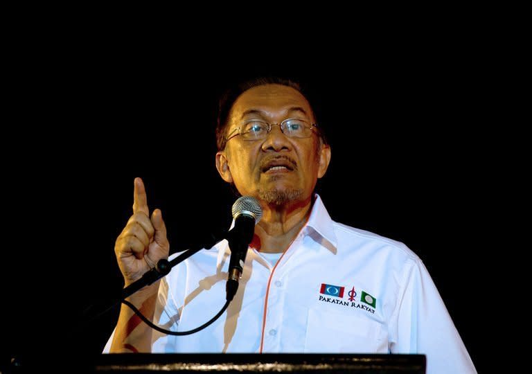 Malaysia opposition leader Anwar Ibrahim speaks during the launch of the party's election manifesto at the Shah Alam Convention Centre in Shah Alam, on February 25, 2013. Malaysian Prime Minister Najib Razak has dissolved parliament in preparation for a general election seen as the toughest challenge yet for the ruling coalition after 56 years in power
