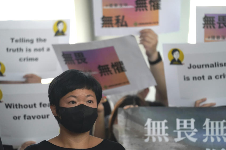 Hong Kong journalist Choy Yuk-ling, also known as Bao Choy, speaks to media outside a court in Hong Kong Thursday, April 22, 2021. The journalist has been found guilty of making false statements in obtaining information for an investigation into an attack on anti-government protesters, in the latest blow to press freedom in the city as authorities continue their crackdown on dissent. (AP Photo/Kin Cheung)