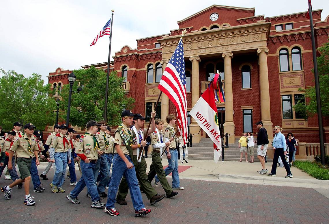 April 8, 2006: The Boy Scouts of Southlake Troop 928 Longhorn Council led the opening parade in Southlake Town Square’s grand opening, which included several new stores, a hotel and movie theater. Bob Booth/SPECIAL TO THE STAR-TELEGRAM