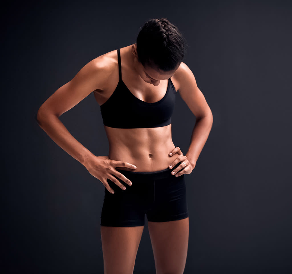 Experts on why it's so hard to get six-pack abs, particularly for women, and why it's not the only sign of a strong core. (Photo: Getty Images)