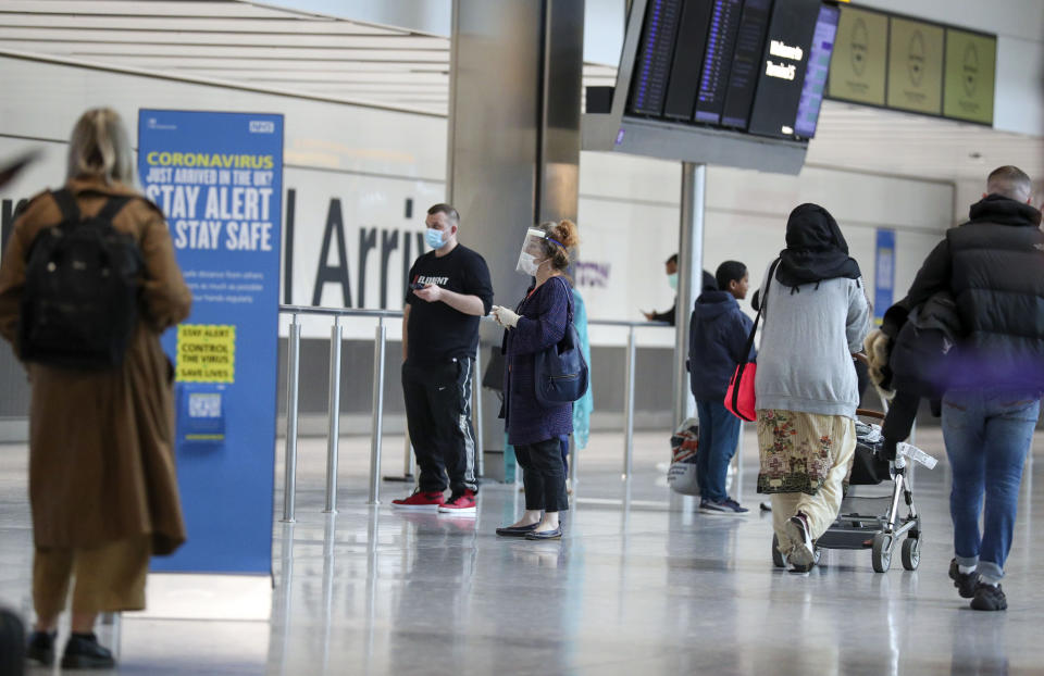 Passengers at Heathrow Airport's Terminal 5, after people returning from Spain were told they must quarantine when they return home.