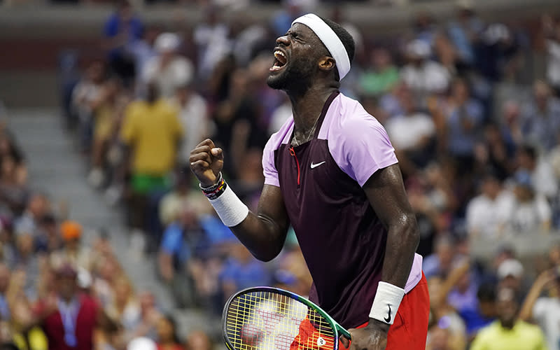 Frances Tiafoe celebrates after winning a point in the U.S. Open tennis championships