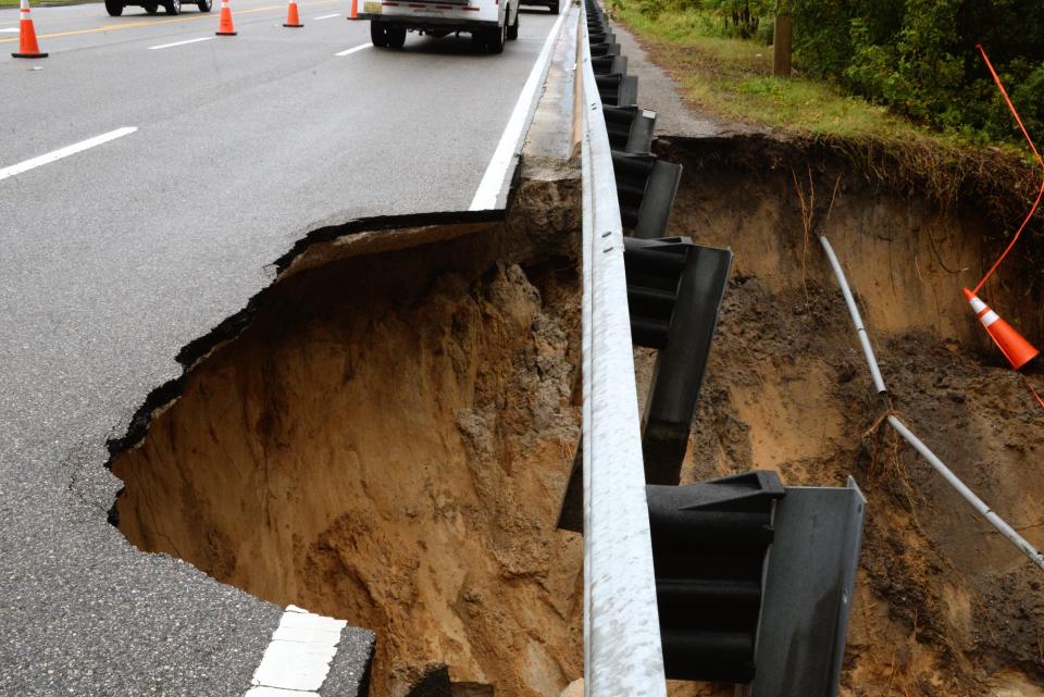 Erosion on South Harbor City Boulevard near the Nissan dealership following Friday's storms.