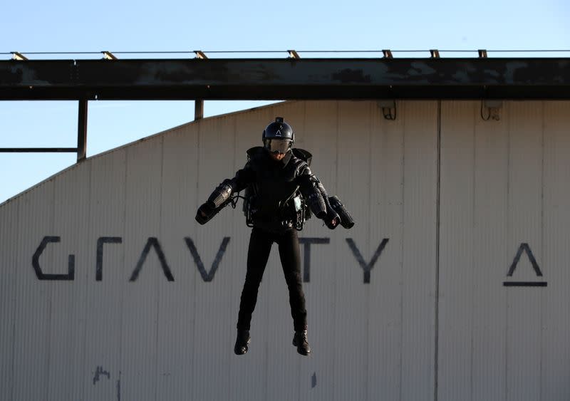 FILE PHOTO: Richard Browning, Chief Test Pilot and CEO of Gravity Industries, wears a Jet Suit and flies during a demonstration flight at Bentwaters Park, Woodbridge