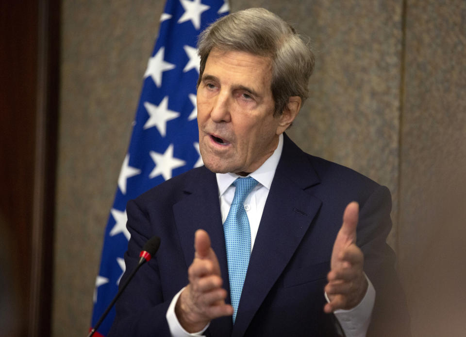 U.S. climate envoy John Kerry speaks during a press conference with Egyptian Foreign Minister Sameh Shoukry, at the foreign ministry headquarters in Cairo, Egypt, Monday, Feb. 21, 2022. (AP Photo/Amr Nabil)