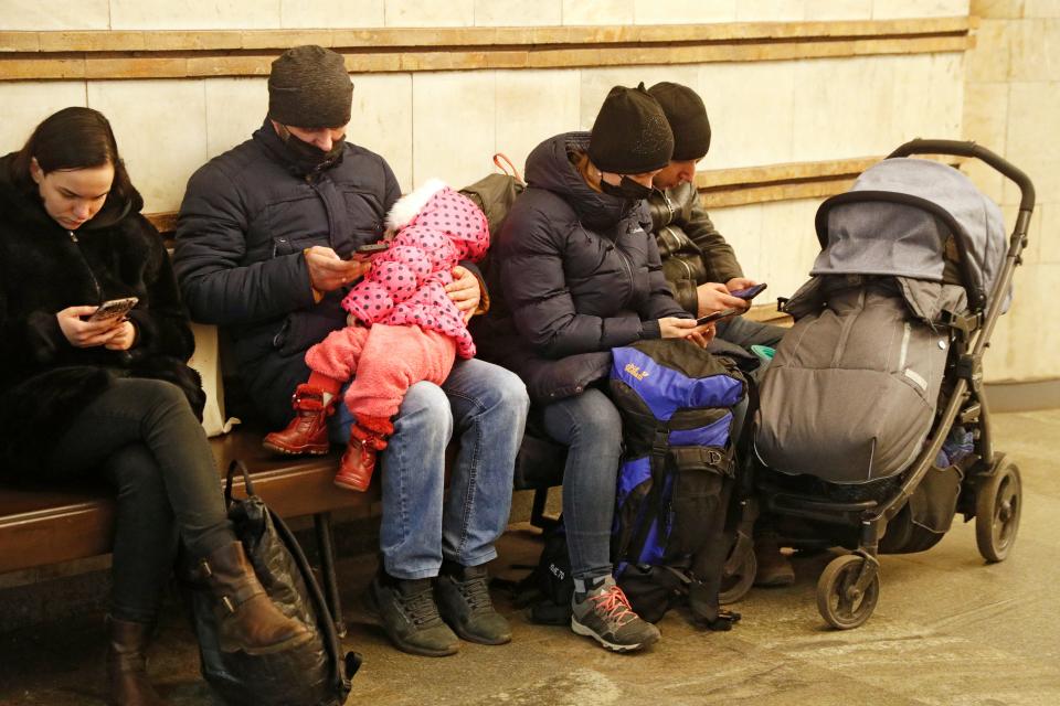 Citizens shelter in a metro station.
