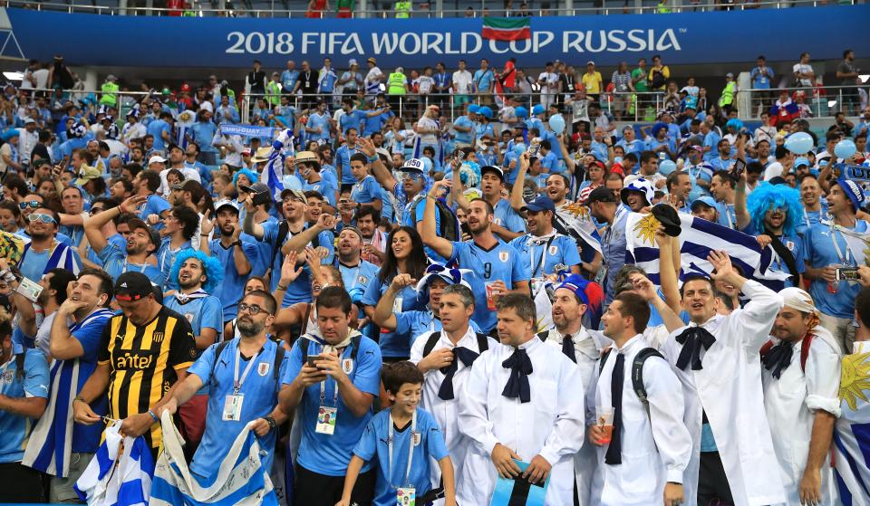 <p>Uruguay fans ahead of the Round of 16 clash with Argentina </p>