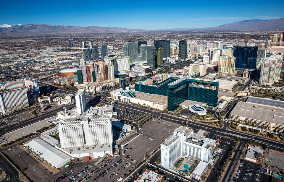 LAS VEGAS, NV - JANUARY 11:  Hotels and attractions, including The Tropicana, The MGM Grand, New York New York and Aria Hotels & Casinos, along the Las Vegas Strip are viewed from the air on January 11, 2022 over Las Vegas, Nevada. Conventions and gamblers have once again returned in large numbers to Sin City despite a surge of infections and hospitalizations due to the Omicron Covid virus. (Photo by George Rose/Getty Images)