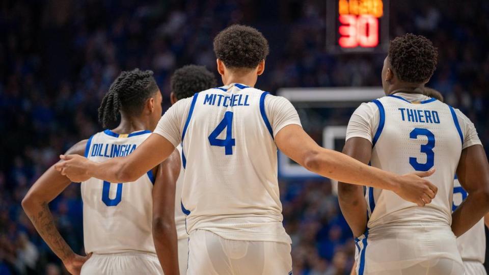 Kentucky’s Tre Mitchell (4), pictured with Rob Dillingham (0) and Adou Thiero (3), said after Saturday’s loss: “We’re human.”