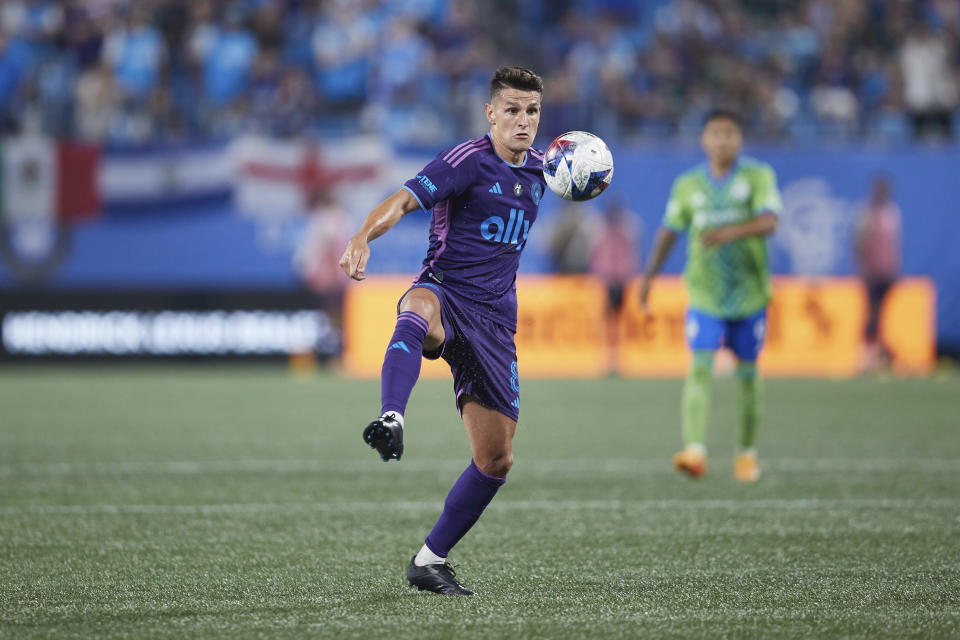 Charlotte FC midfielder Ashley Westwood (8) controls the ball out of the air during an MLS soccer match against the Seattle Sounders, Saturday, June 10, 2023, in Charlotte, N.C. (AP Photo/Brian Westerholt)