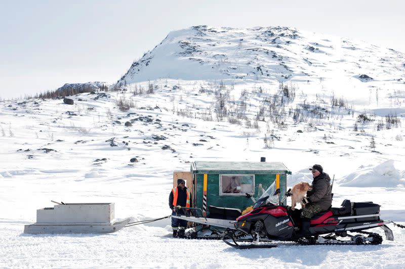 The Wider Image: Climate change means the Inuit do what they've always done: Adapt