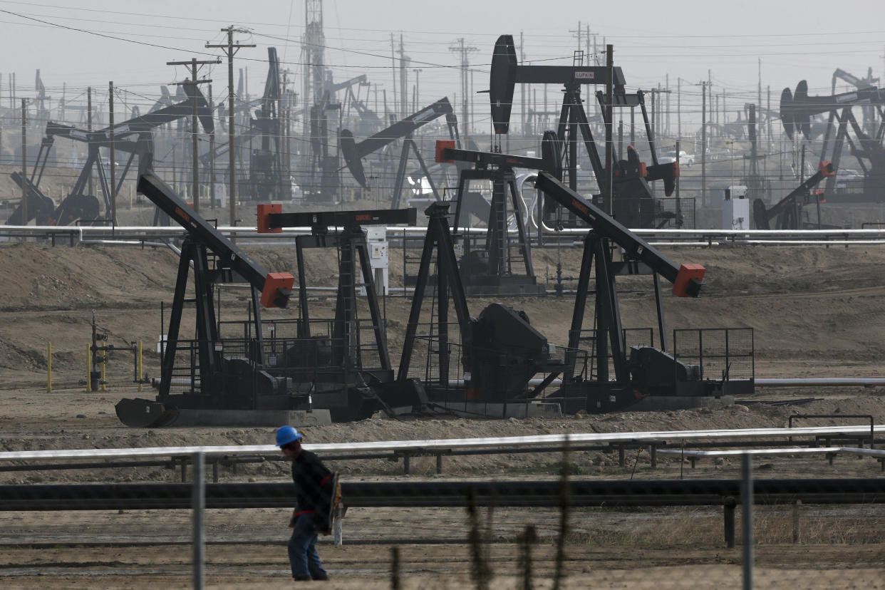 Pumpjacks operate at the Kern River Oil Field in Bakersfield, Calif., in 2015. (Jae C. Hong/AP)