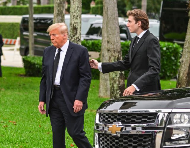 Former US President Donald Trump and his son Barron Trump. Photo by GIORGIO VIERA/AFP via Getty Images.