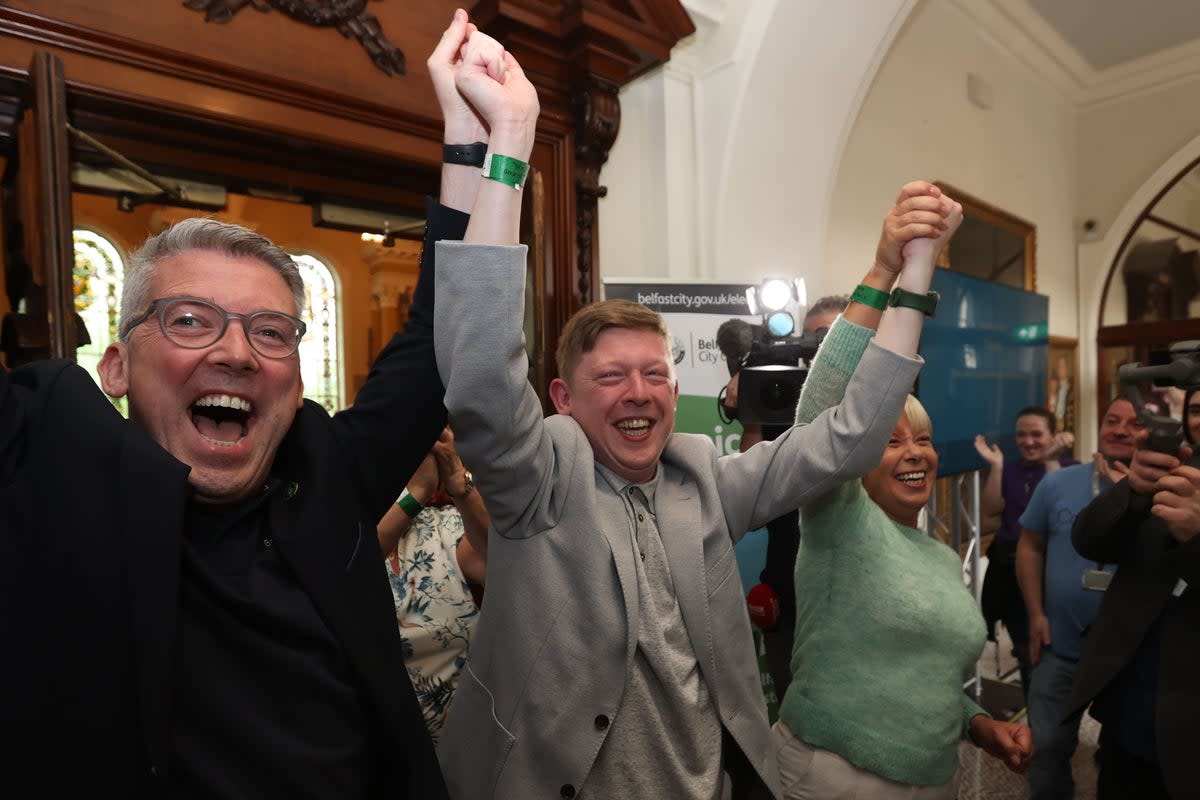 Sinn Fein celebrate winning a seat at the Northern Ireland council elections at Belfast City Hall (PA)