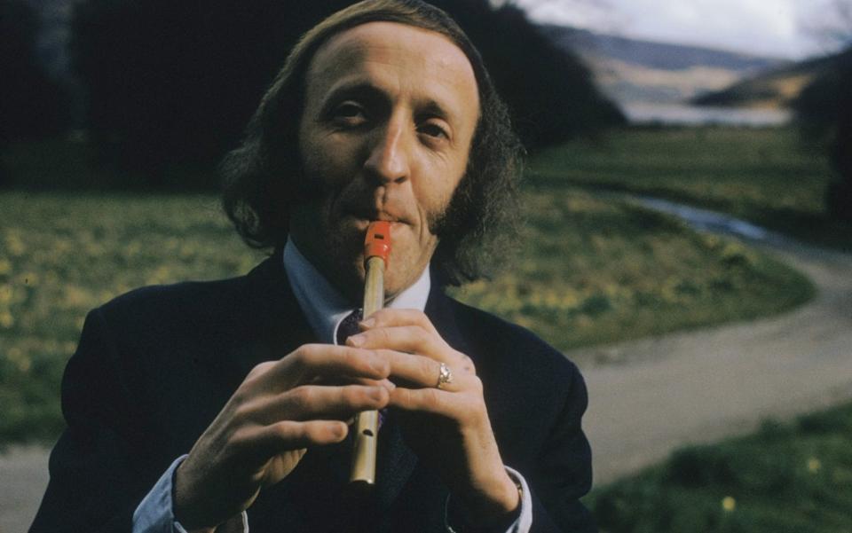 Paddy Moloney playing a tin whistle, June 1973 - Susan Wood/Getty Images