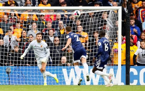 Daryl Janmaat scores an own goal to double Wolves' lead - Credit: Reuters