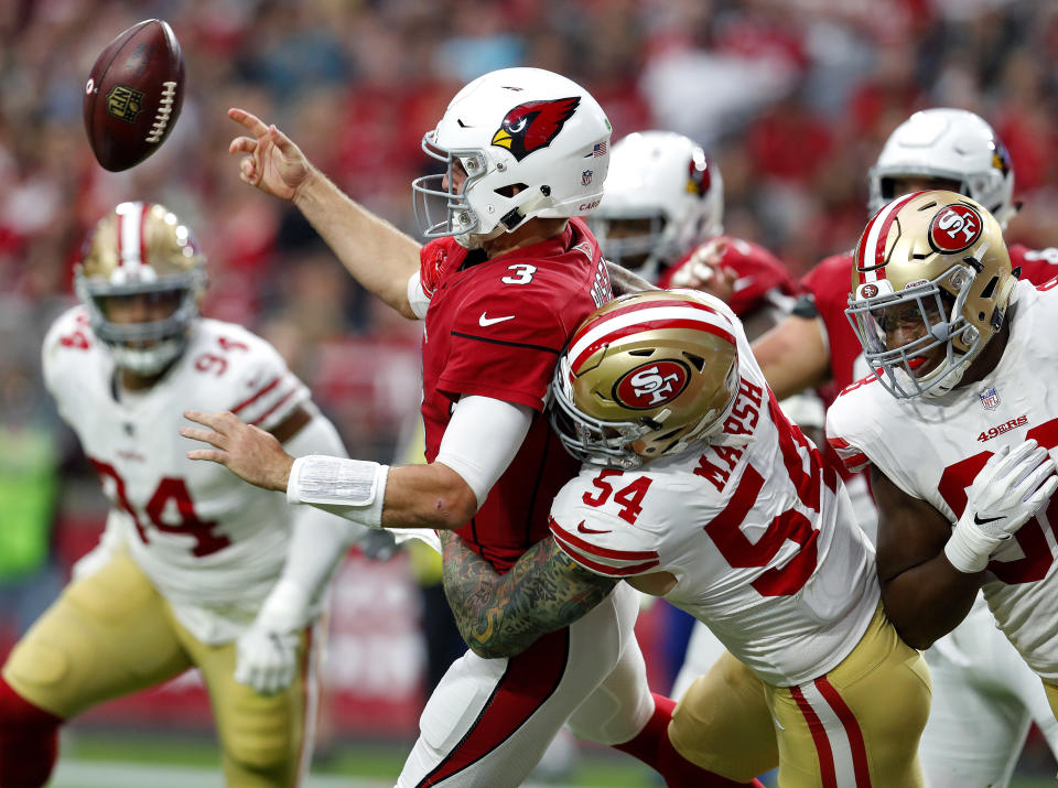 Arizona Cardinals quarterback Josh Rosen (3) intentionally grounds the football as San Francisco 49ers defensive end Cassius Marsh (54) makes the tackle in the end zone during the first half of an NFL football game, Sunday, Oct. 28, 2018, in Glendale, Ariz. The 49ers recovered resulting in a safety. (AP Photo/Ralph Freso)