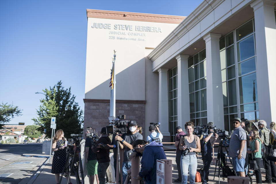 Media members gather outside District Court as they await the arrival of Actor Alec Baldwin, for jury selection in his involuntary manslaughter trial, Wednesday, July 10, 2024, in Santa Fe, N.M. (AP Photo/Roberto E. Rosales)