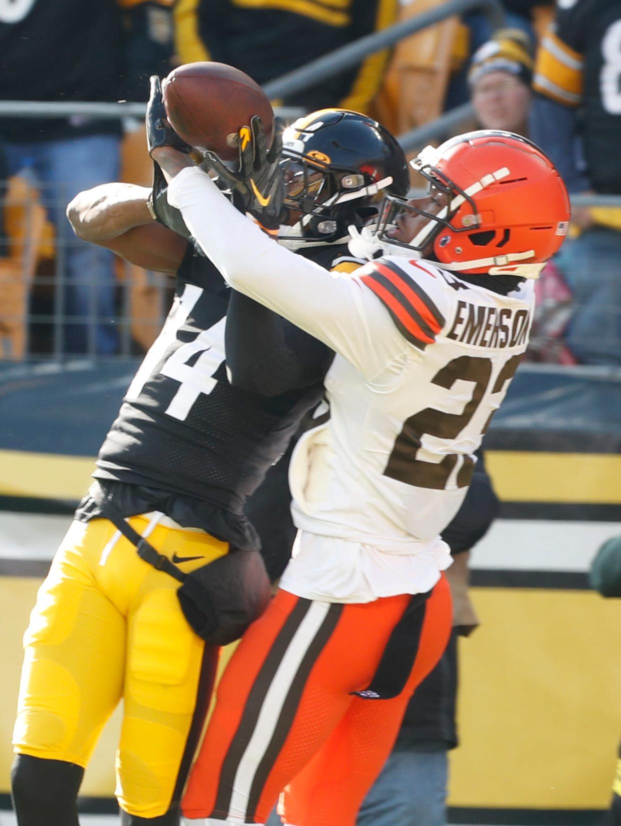 Cleveland Browns cornerback Martin Emerson Jr. (23) defends a pass intended for Pittsburgh Steelers wide receiver George Pickens (14) on Jan. 8, 2023, in Pittsburgh.