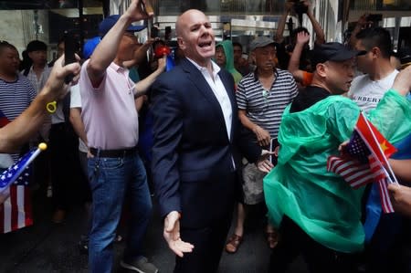 People engage in scuffles outside Grand Hyatt hotel, where Taiwan's President Tsai Ing-wen is supposed to stay during her visit to the U.S., in New York City